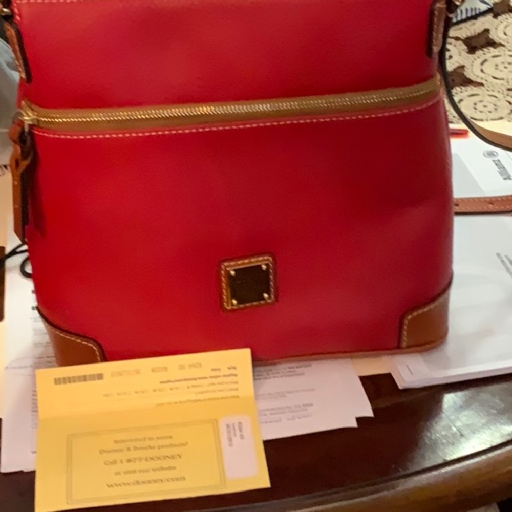 DOONEY AND BOURKE BAG BNWT. NEVER USED. BEEN IN STORAGE ONE YEAR.